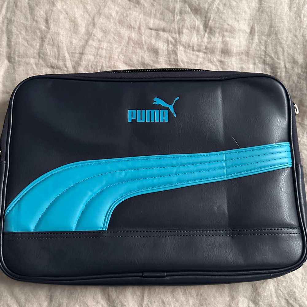 Puma Laptop Sleeve for 13” MacBook. Good condition, barely used.